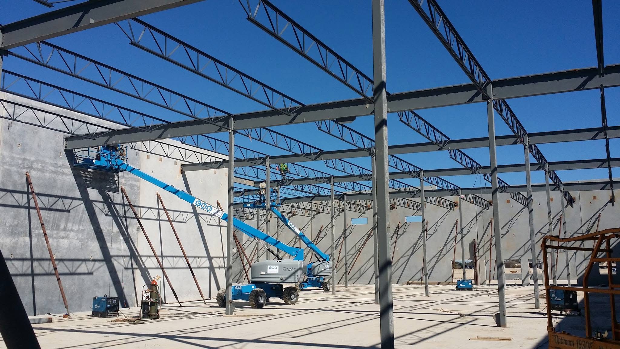Steel erection project with structural framing and tilt-wall panels
